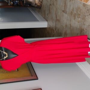 Red V neck jumpsuit size medium see measurements in photos Polly and Esther/euc